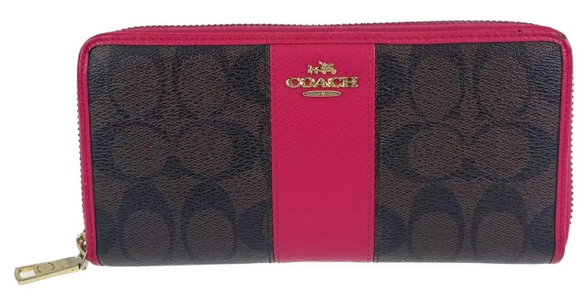 Cartera larga de cuero con firma Coach Castaño 
